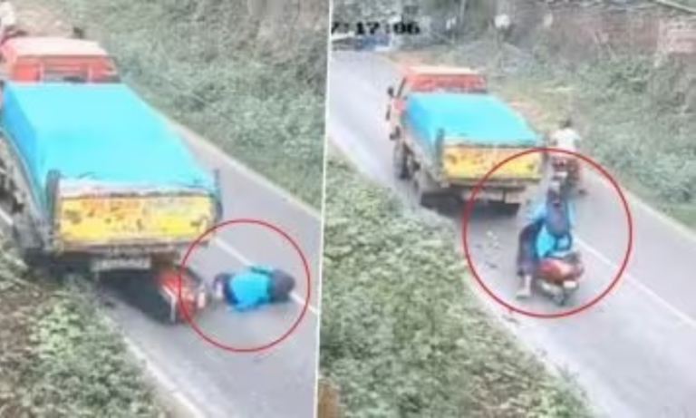 कुछ सेकेंड दूर थी मौत,  ट्रक के नीचे आने से बाल-बाल बची महिला, स्कूटी हुई चकनाचूर  वीडियो वायरल