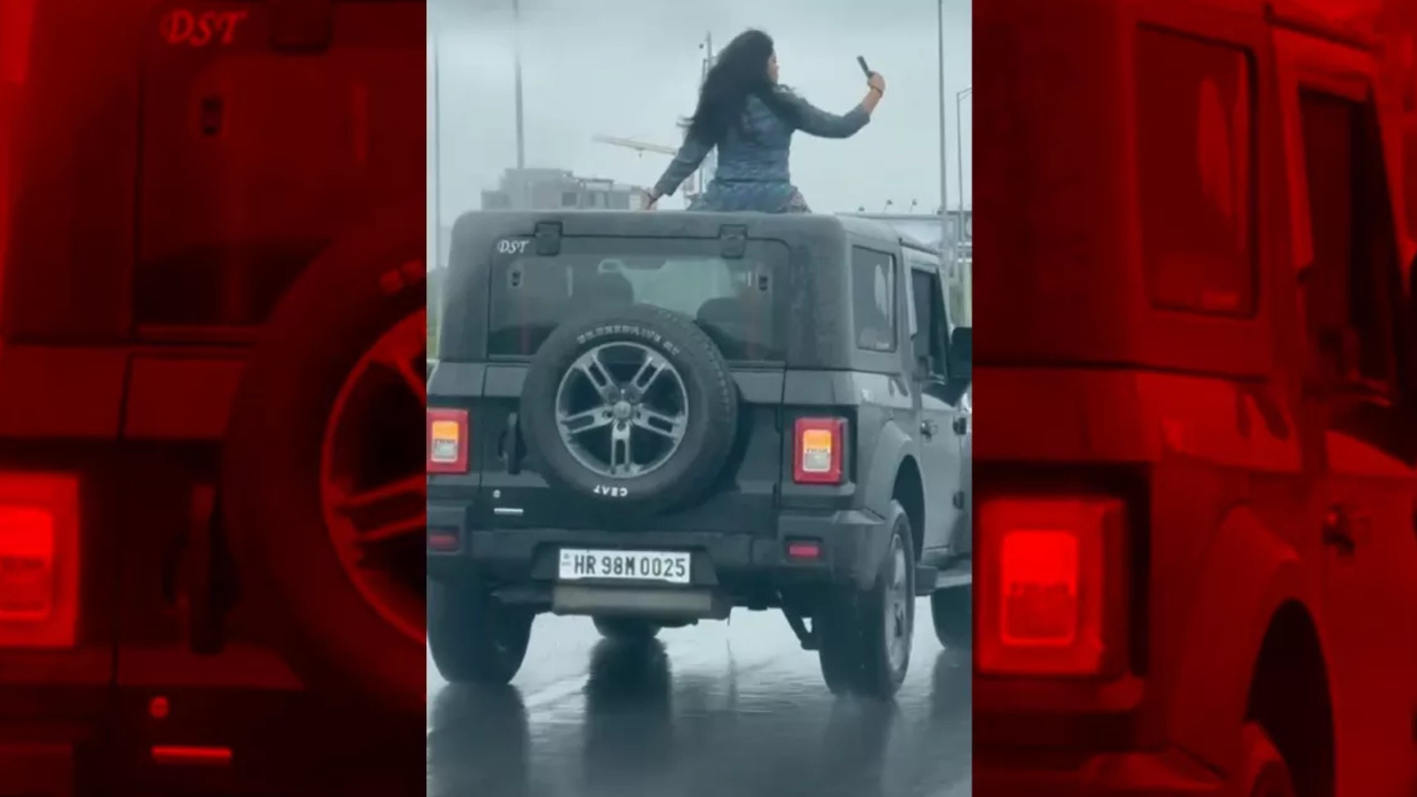 गुरुग्राम में खतरनाक स्टंट, युवती दिखी चलती Thar SUV की छत पर बैठी वीडियो वायरल, पुलिस ने लिया संज्ञान